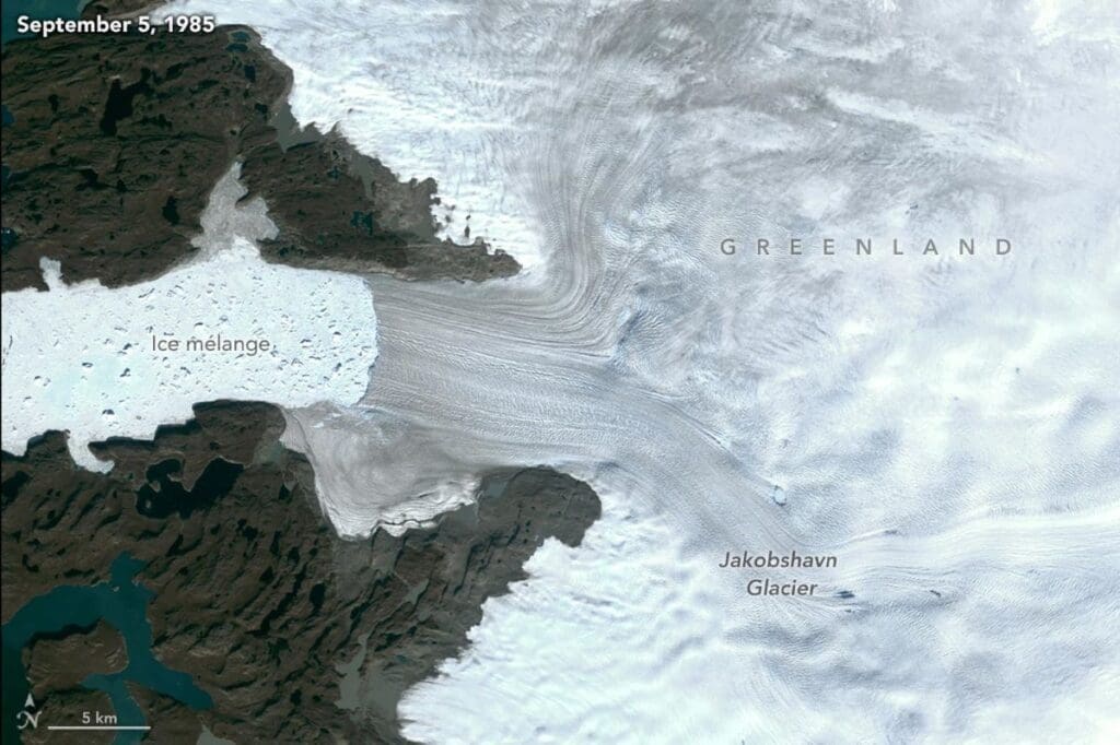 Jakobshavn Isbrae, a glacier on Greenland’s western coast, is shown in imagery taken on September 5, 1985, by the Landsat 5 satellite