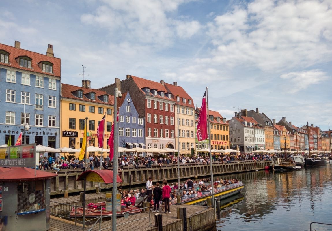 Image: Colorful building facades along the Nyhavn Canal at Copenhagen Denmark