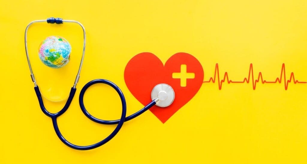 Climate change is killing us - in more ways than one Image: Top view of paper heart with heartbeat and stethoscope