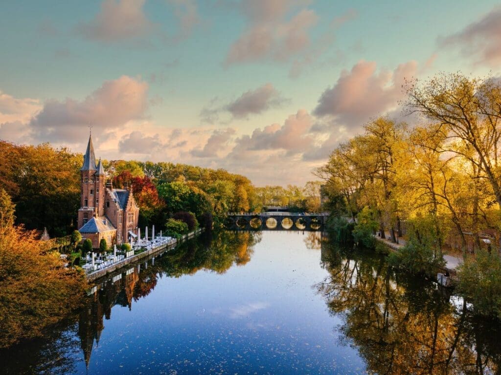 Waterfront cities in Europe set sail for climate resilience Image: Lake view from Kasteel Minnewater at sunset, Belgium, Europe