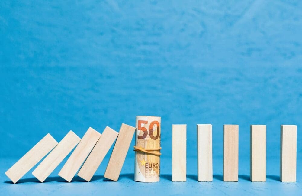 Image: Fallen wooden pieces and banknotes