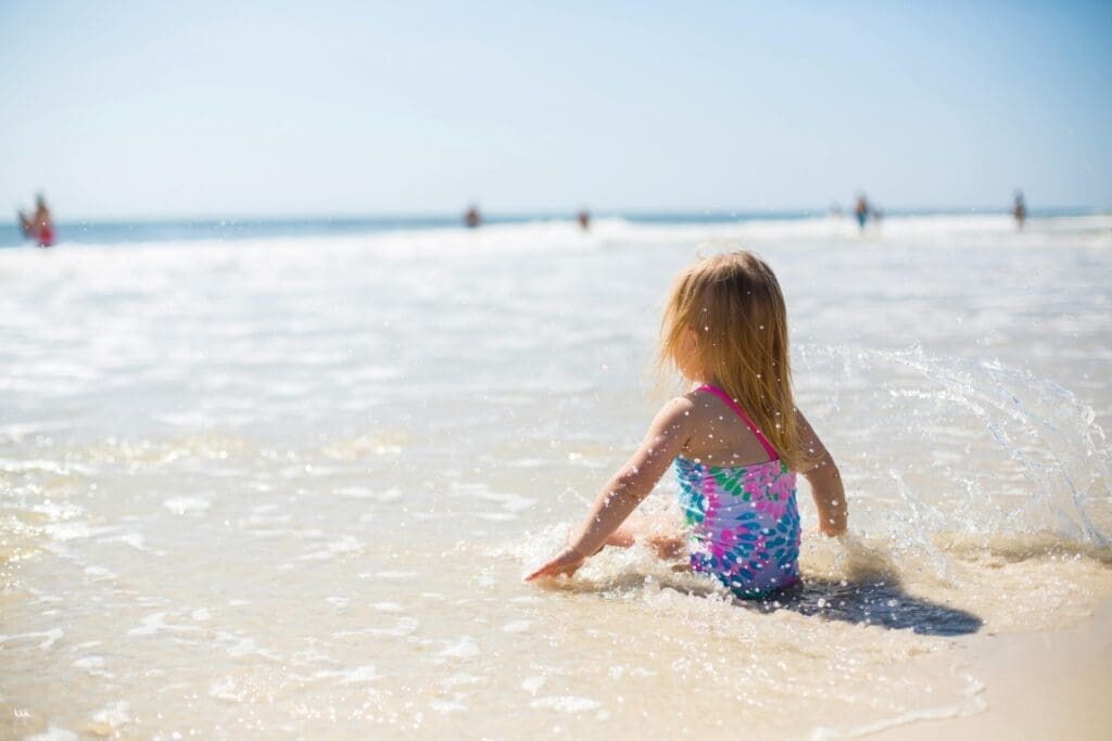 Most bathing sites in Europe safe: EU environment agency Girl Sitting on Shore