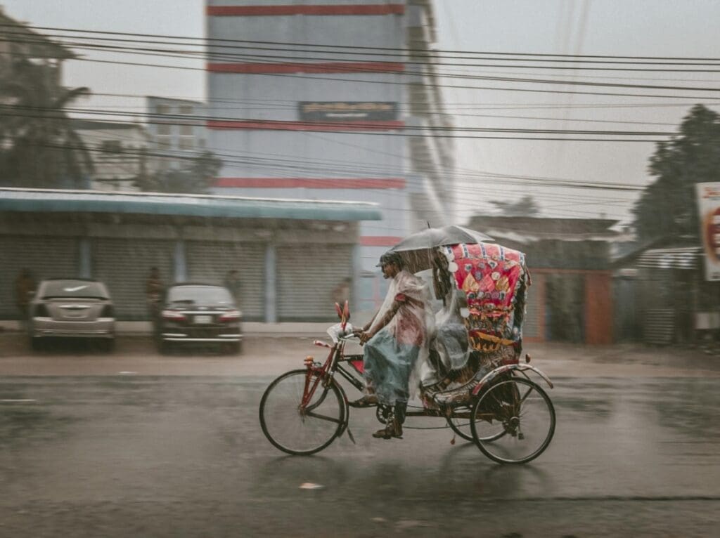 Image: Rickshaw on the Road During Rainy Day (s. monsoon, atmospheric memory, climate)
