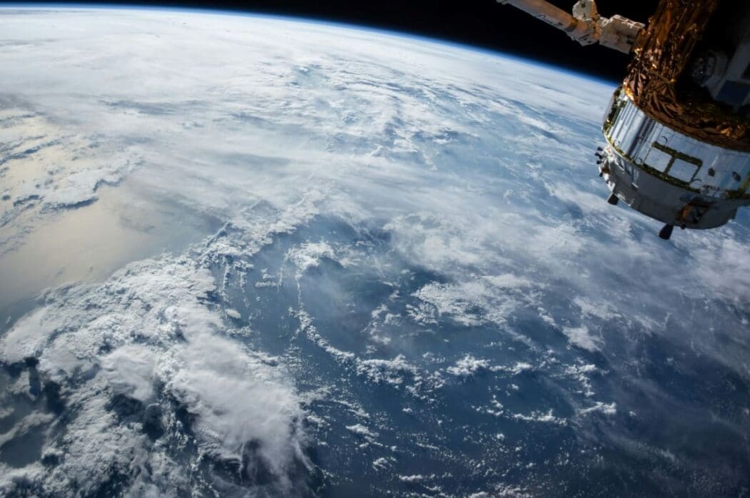 Image: View of Earth and satellite