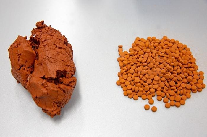 Decomposing 'refrigerants', a potent greenhouse gas, using industrial waste Industrial waste red mud raw material left andpelletized red mud catalyst right
