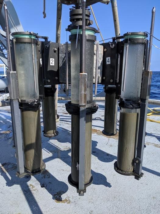 Image: Close up of multicorer rig on the stern of the R/V Armstrong. Multicorers are used to collect the most recently deposited ~50cm of sediments, which includes the uppermost layer at the water/sediment interface (s. Gulf Stream)