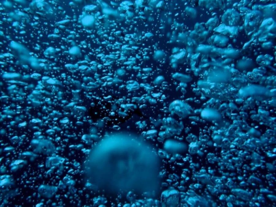 Image: blue and white bubbles in water
