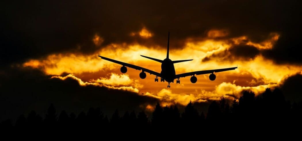 Image: Airplane Silhouette on Air during Sunset