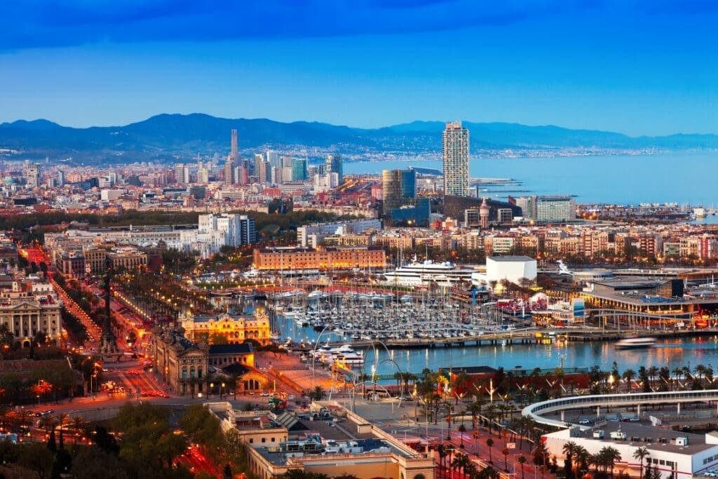 Compact cities have lower carbon emissions, but poorer air quality, less green space and higher mortality rates port vell sunset from montjuic res