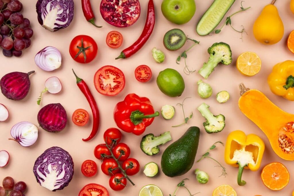 Shifting dietary habits may reduce greenhouse gas emissions Image: Flat lay fruits and vegetables arrangement