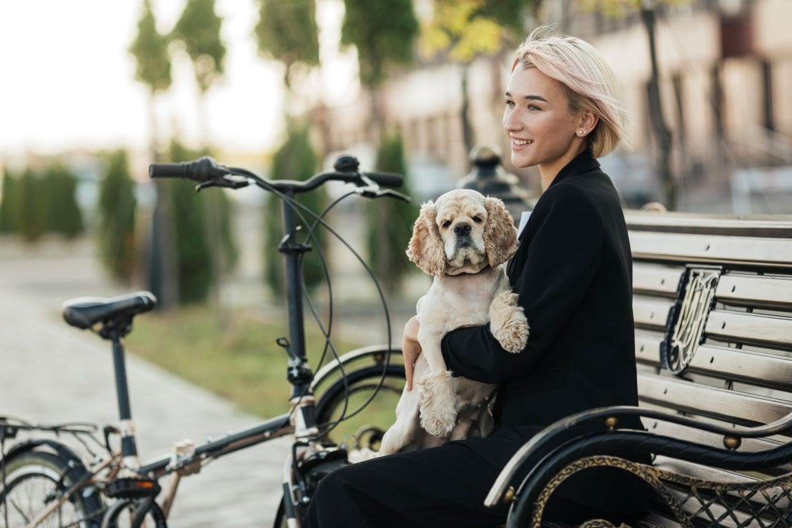 Image: woman petting her cute dog
