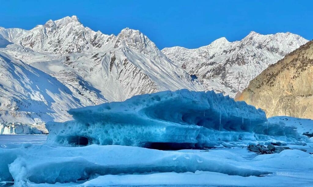 Glacier beside snow