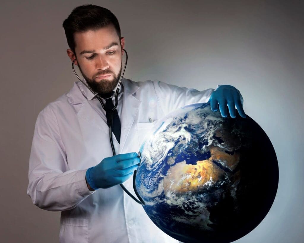 Key opportunities to boost climate education for healthcare professionals Image: Front view doctor with medical stethoscope, Earth