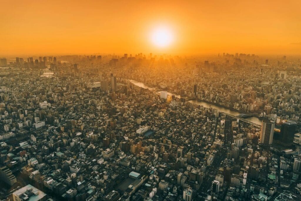 Tokyo logs record 10 days of 35°C or more Image: aerial view of city during golden hour, Sunset over Tokyo