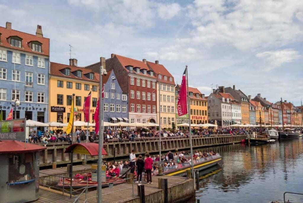 Image: Colorful building facades along the Nyhavn Canal at Copenhagen Denmark
