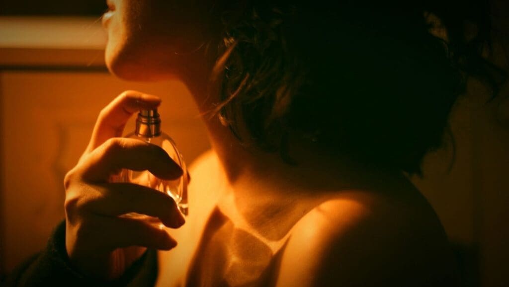 Woman using a perfume