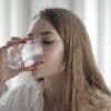 EU watchdog reduces safe level of exposure to 'forever chemical' TFA Woman Drinking Water