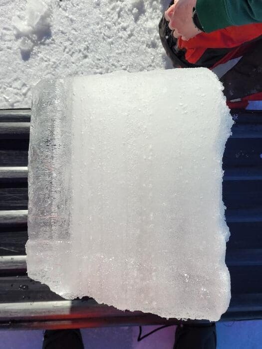 A block of white lake ice. 