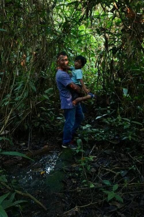 Local residents in the dense Amazon rainforest, near the Pastaza-Marañón Foreland Basin