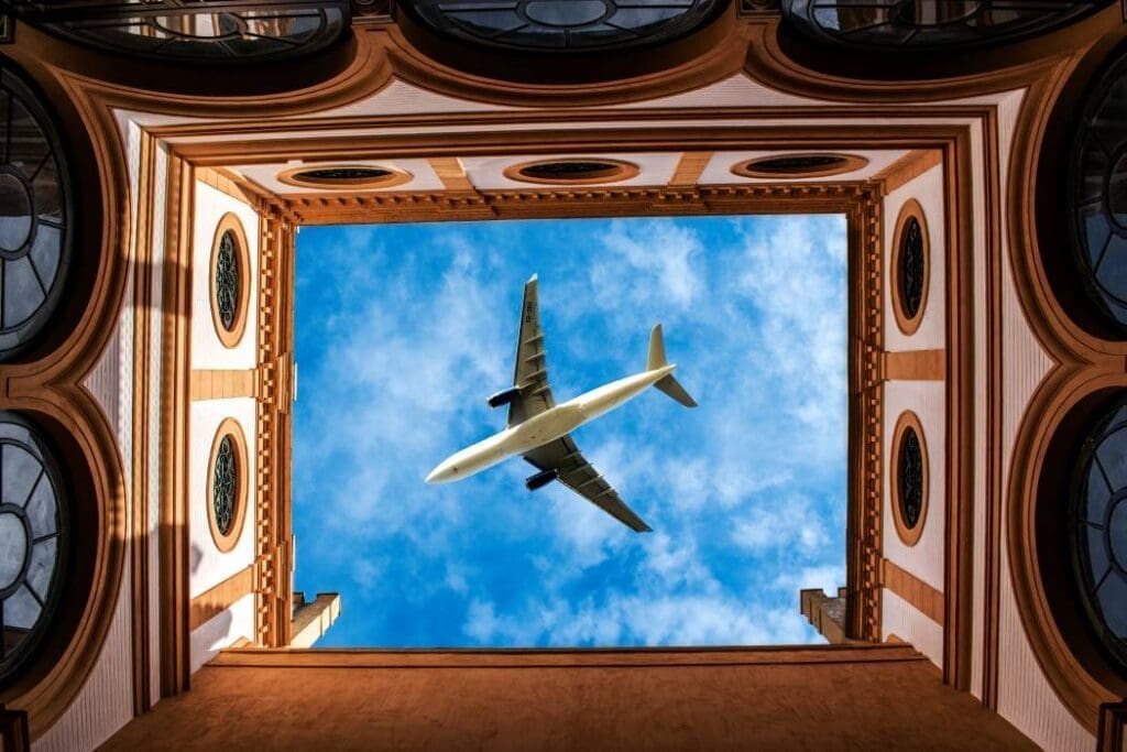 Aircraft noise exposure tied to increased heart risks, study shows Airplane flying above a building - noise exposure