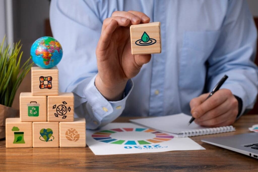 Almost all nations miss UN deadline for new climate targets man wooden blocks sdg res
