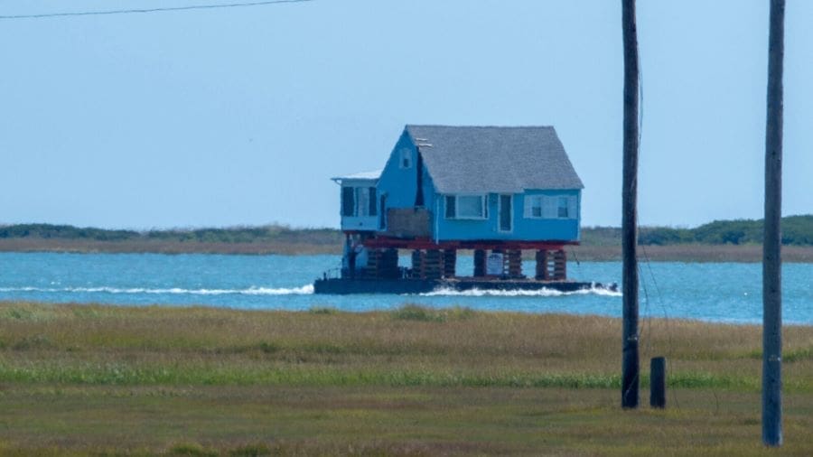 Image: A house transported by barge