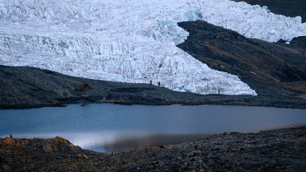 Image: Pastoturi glacier in Peru. A glacial lake is seen in the foreground.