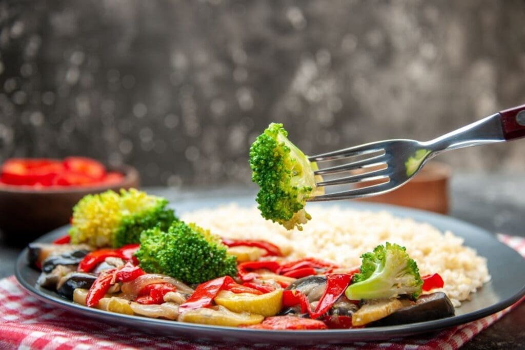 Image: Front view delicious pearl barley with tasty cooked vegetable (s. science, climate)