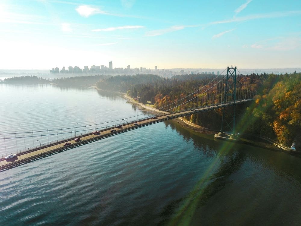 British Columbia cities uneven in heat preparedness Image: aerial view of island with bridge (s. canada, vancouver, british columbia)