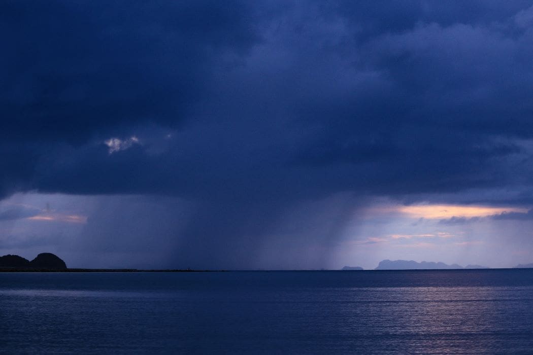 Image: Ocean under a cloudy sky, rain