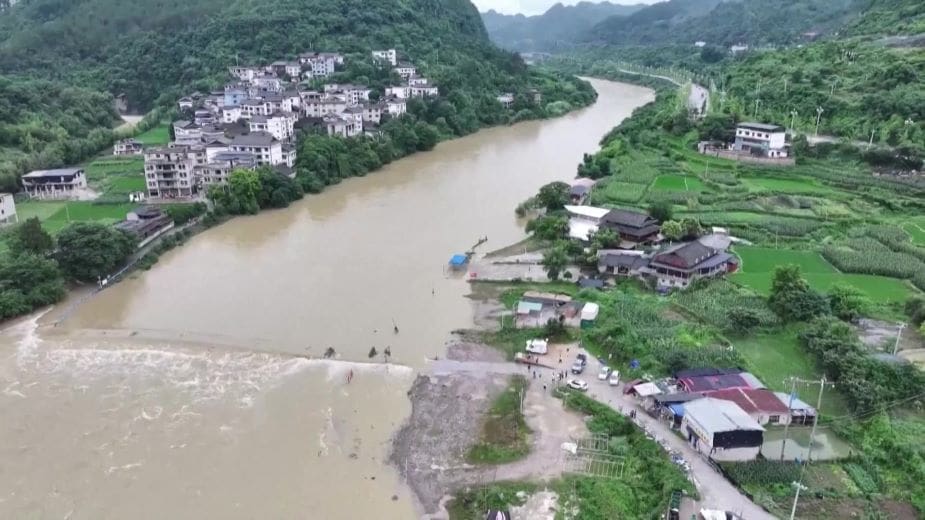 Image: the iImage shows surging floodwaters the country's southwestern province of Guizhou, where severe flooding has forced more than 80,000 people to flee their homes