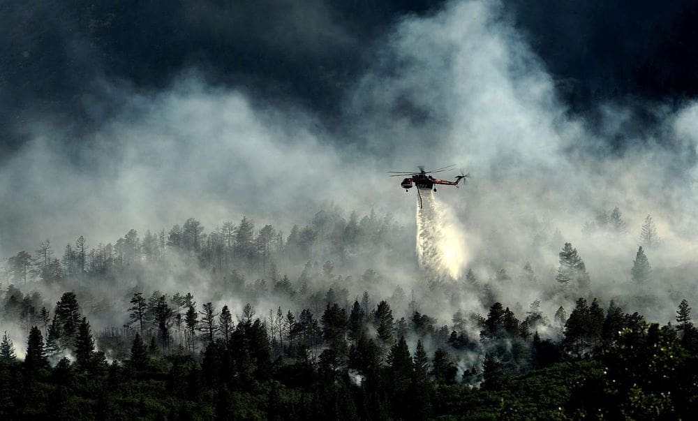 Wildfires linked to sharp rise in deaths during 2023 Maui blaze Image: Helicopter, wildfire