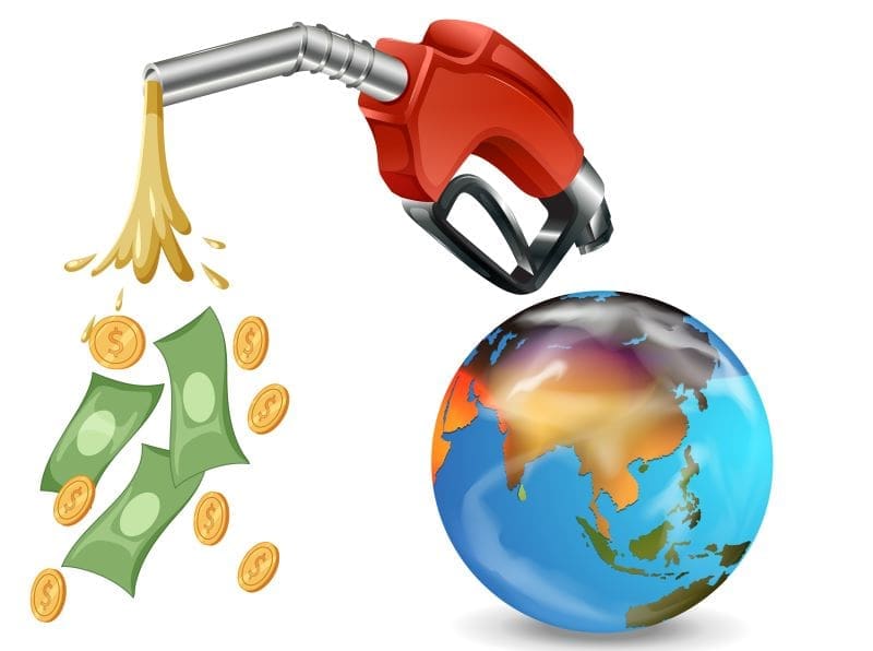 Banks put more money into fossil fuels than clean energy, report Image: Fueling nozzle gasoline and earth planet, money (s. fossil fuels)