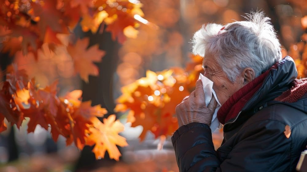Image: Adult blowing their snot in a tissue