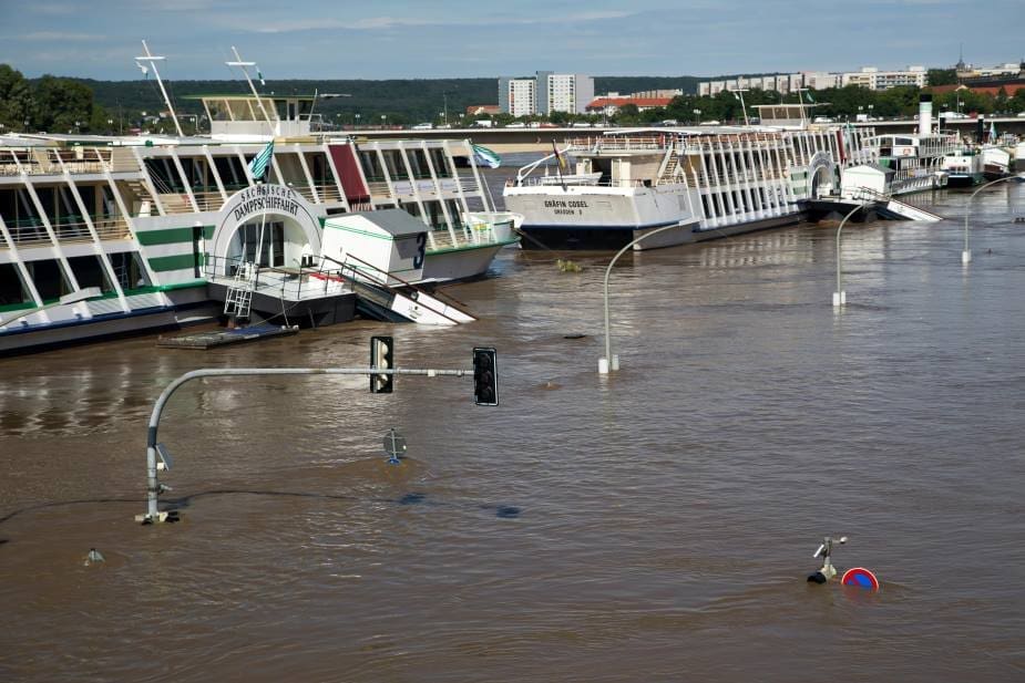 Image: Flooded Street with Partially Submerged Boats (s. Germany)