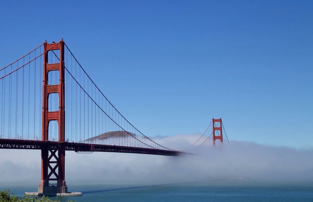Image: landscape photo of foggy bridge