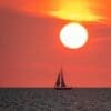Image: Silhouette of Sailboat on Sea during Sunset