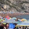 Europe heatwave closes schools, threatens health Image: Beach, People, Heatwave
